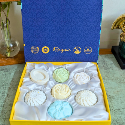 Box of bath bombs with a blue and yellow box featuring 'Love Organic' branding.